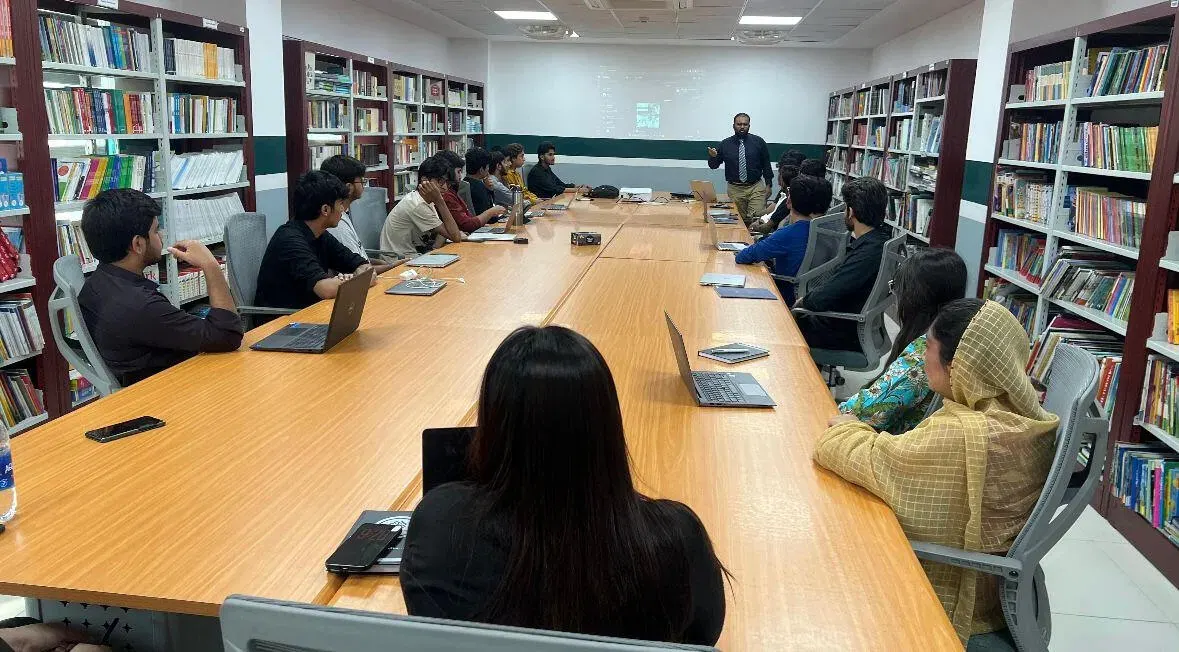 Munawar Kazmi leading a hands-on robotics and ML workshop at Pak-Turk Maarif Schools